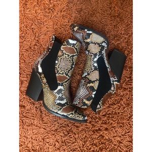 Never worn animal print booties size 8